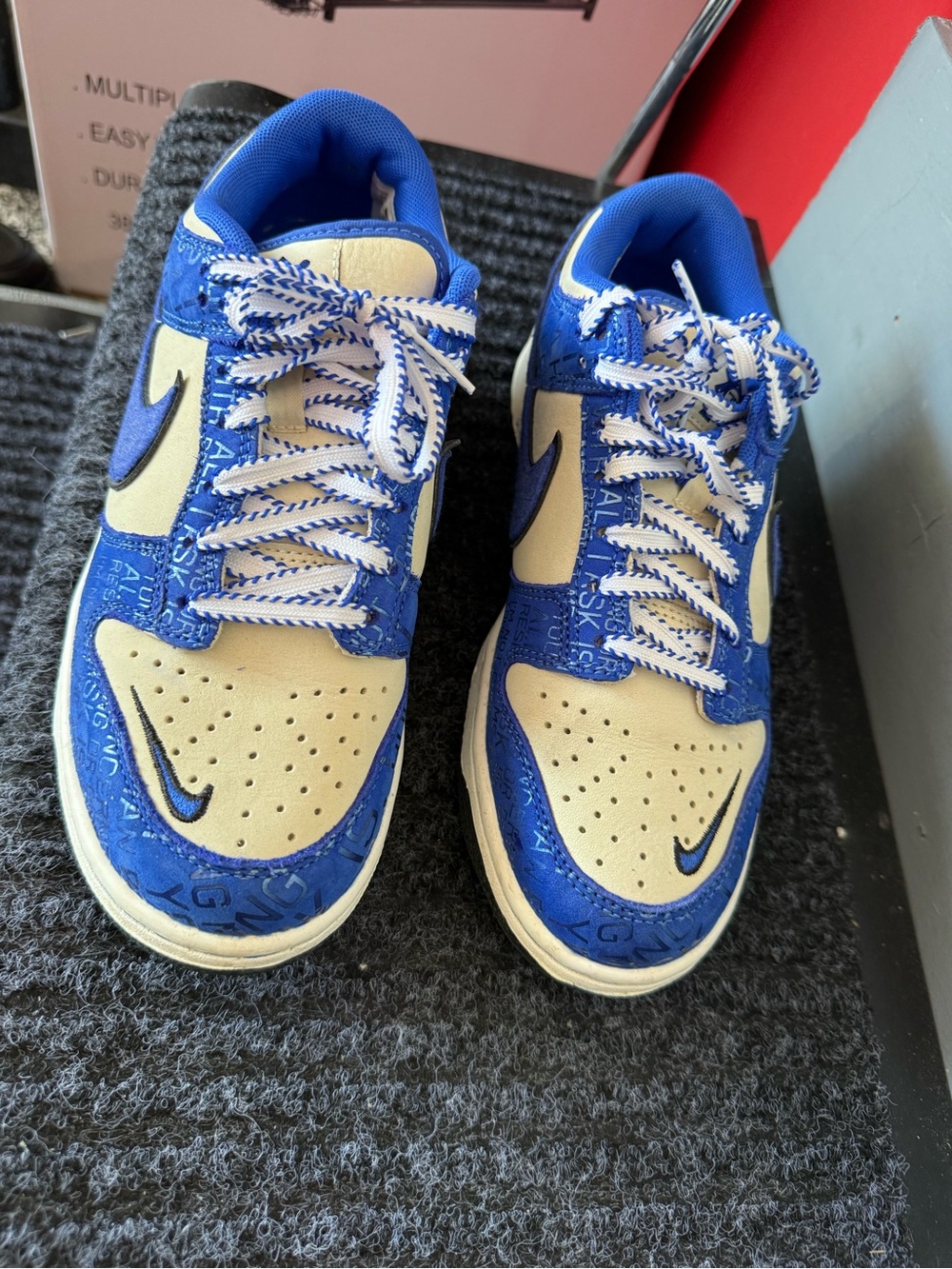 Nike Kids Blue and Cream Low-Top Sneakers with Graphic Accents